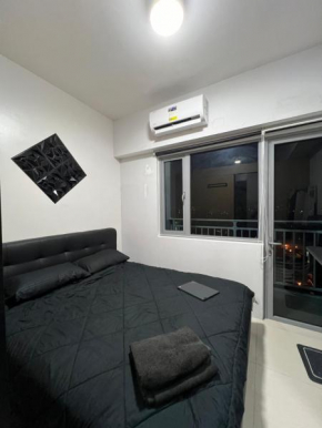 1BR Condo with Lazy Boy and Videoke in Grass Residences at SM North Edsa